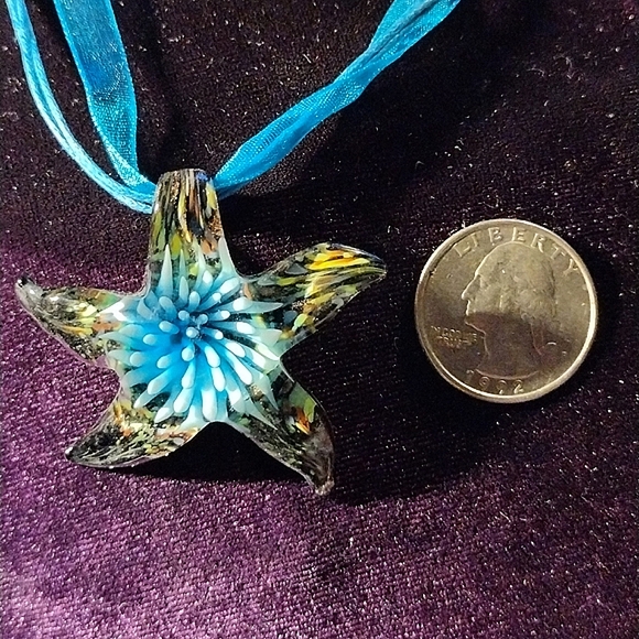 ? Jewelry - 18", turquoise silk necklace with a murano glass flower starfish pendant.